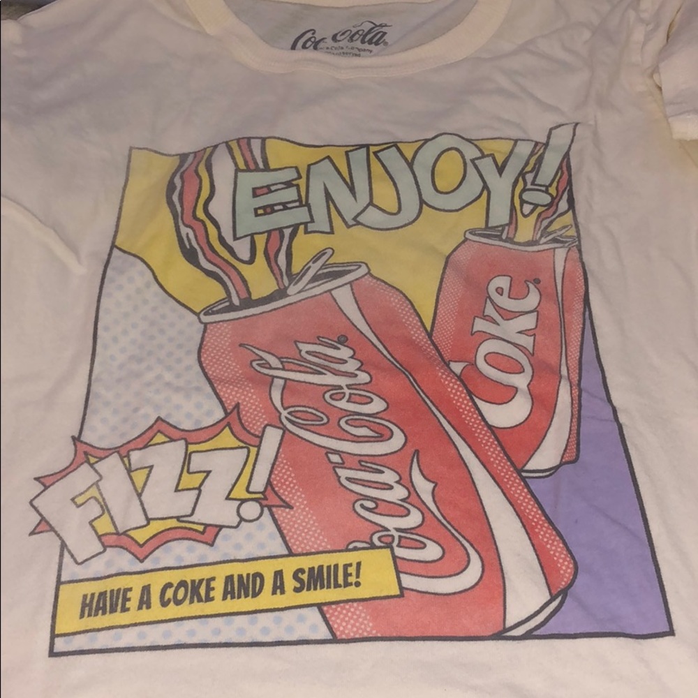 cream colored Coca Cola t shirt
